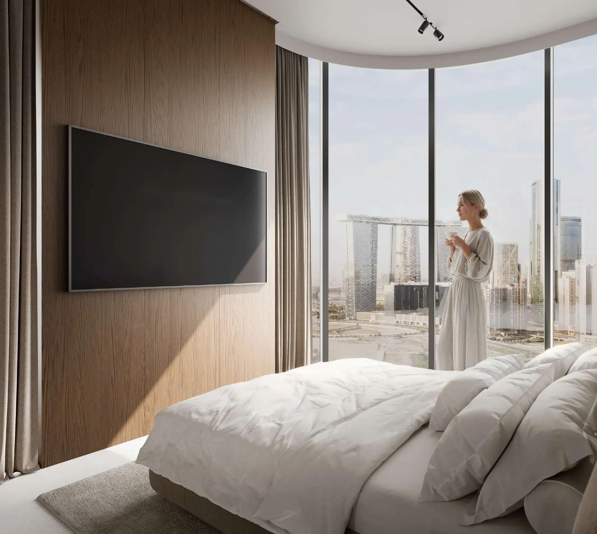 Bedroom with Abu Dhabi skyline view at A1LA Residence