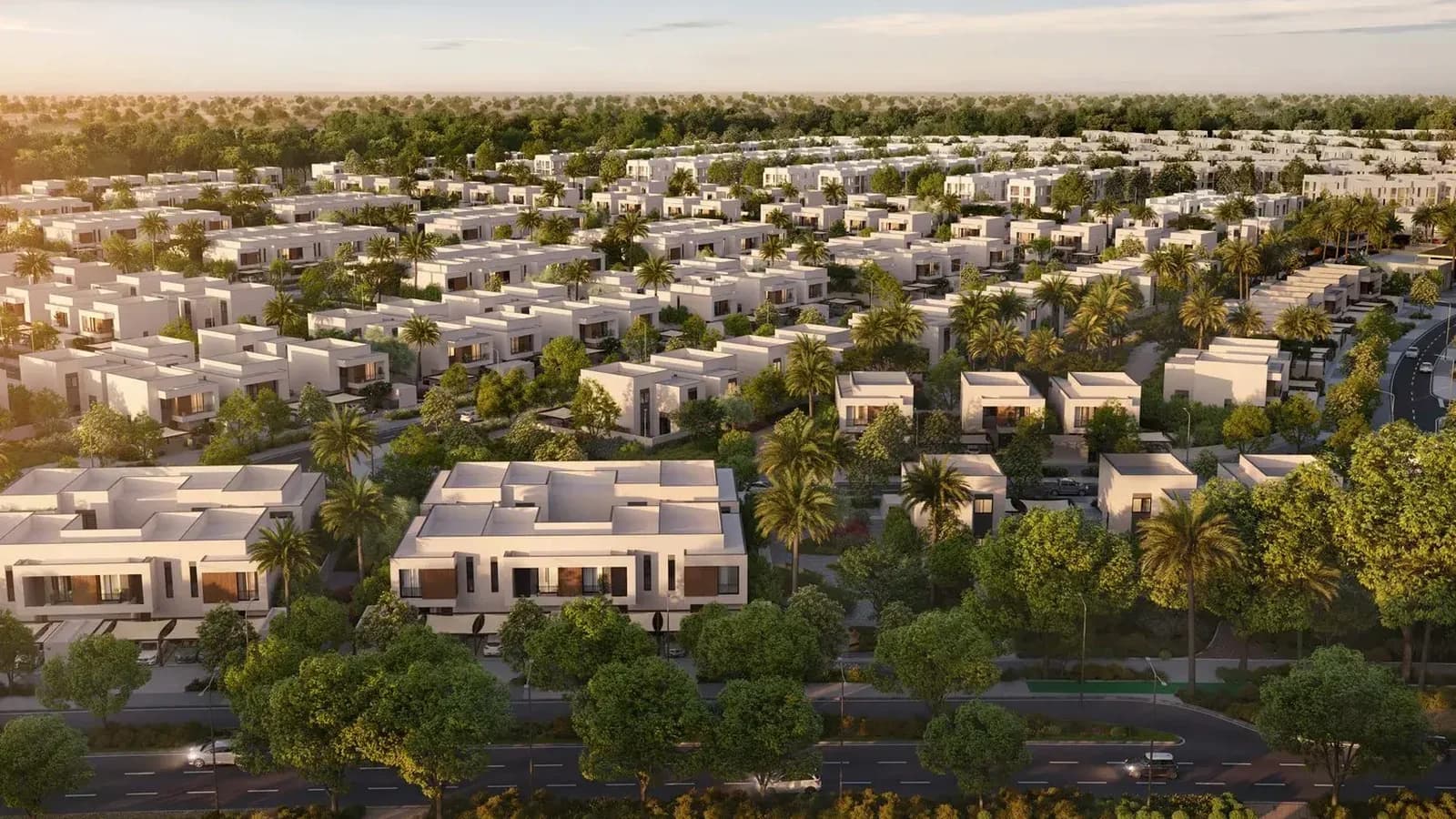 Aerial masterplan view of Al Ghadeer Parks 2 with landscaped streets and plex homes
