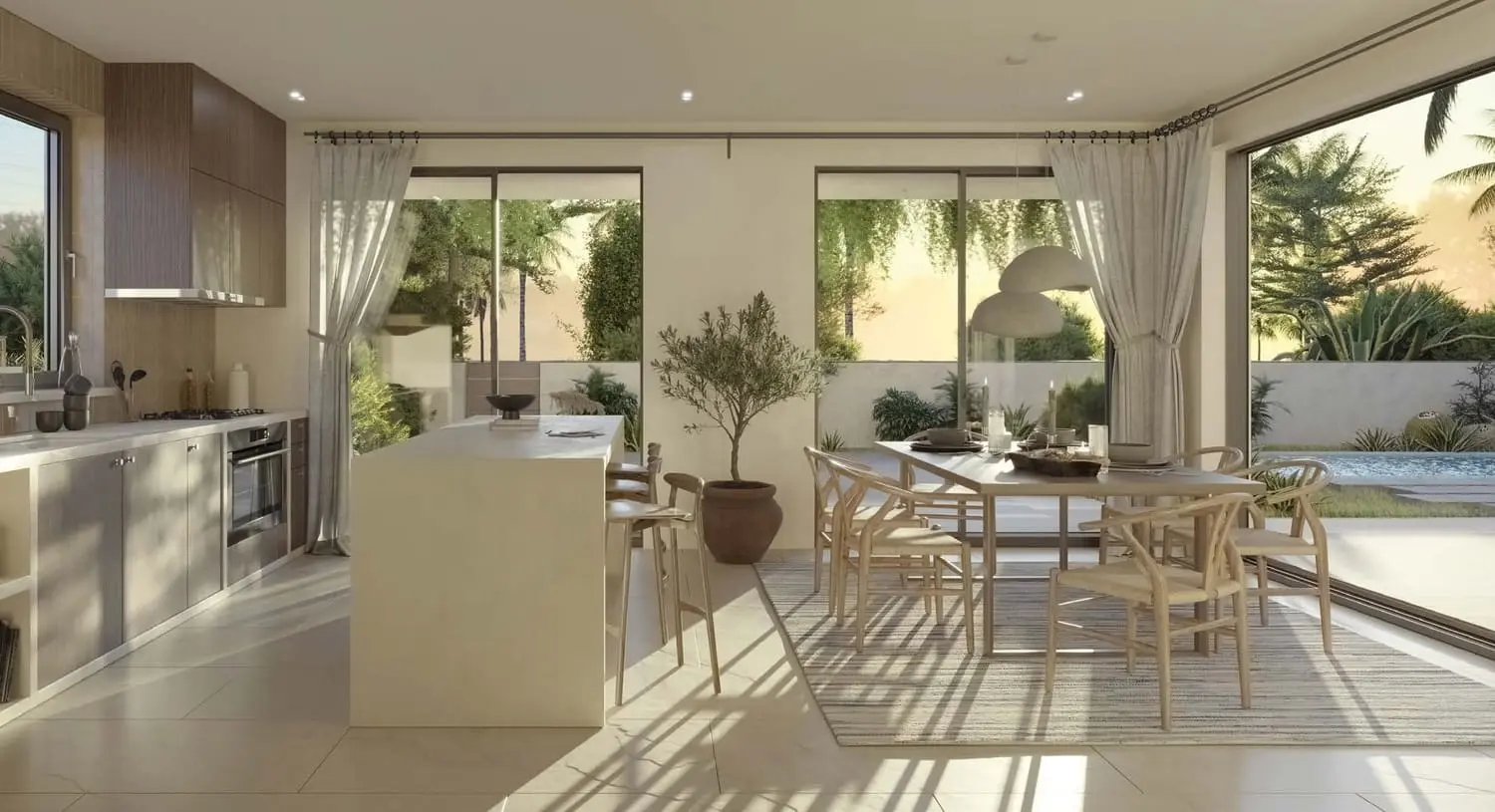 Kayan Villas Rihal kitchen and dining area facing the landscaped courtyard