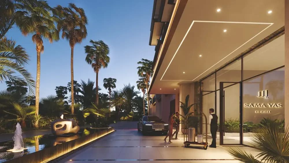 Evening entrance and porte-cochère at Sama Yas by Aldar Properties on Yas Island, Abu Dhabi