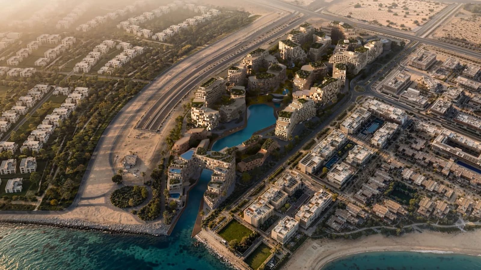 Aerial rendering of The Wadi by Reportage Properties on the Yas Canal in Abu Dhabi, with canal-front buildings around a landscaped lagoon at golden hour