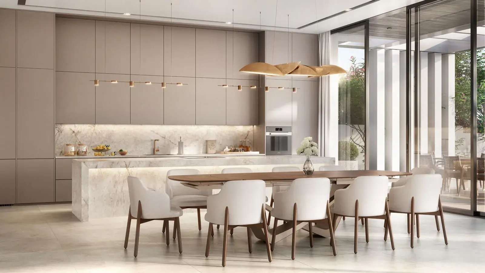 Modern kitchen and dining room in a Bashayer villa on Hudayriyat Island, Abu Dhabi with marble finishes by Modon