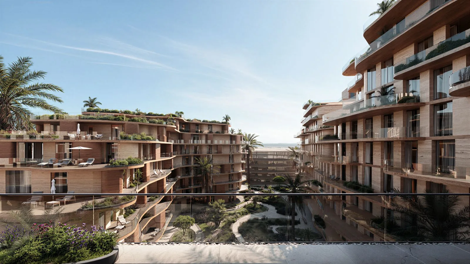 Terrace view across The Wadi courtyard and curved residences on the Yas Canal in Abu Dhabi