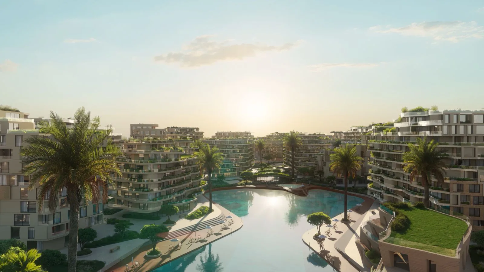 Sunrise over the central lagoon pool at The Wadi on the Yas Canal in Abu Dhabi