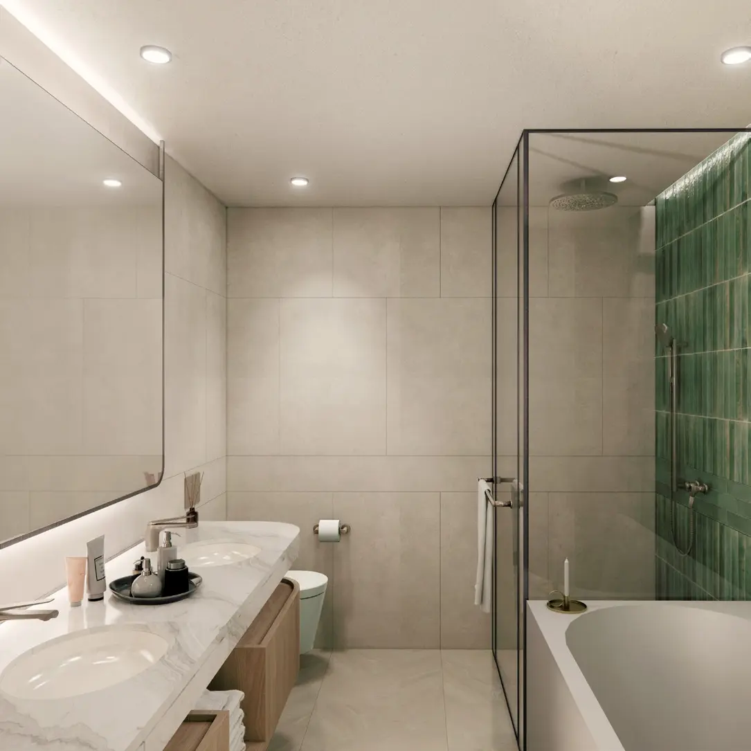 Naseem Al Jurf family bathroom with tiled walls and fitted storage