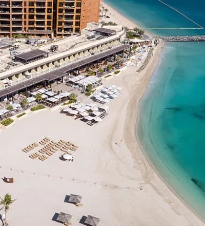 Palm Springs by Nakheel, developer Nakheel, Dubai: Club Vista Mare beach club on Palm Jumeirah. This photograph shows Palm Jumeirah, not the Palm Springs community.
