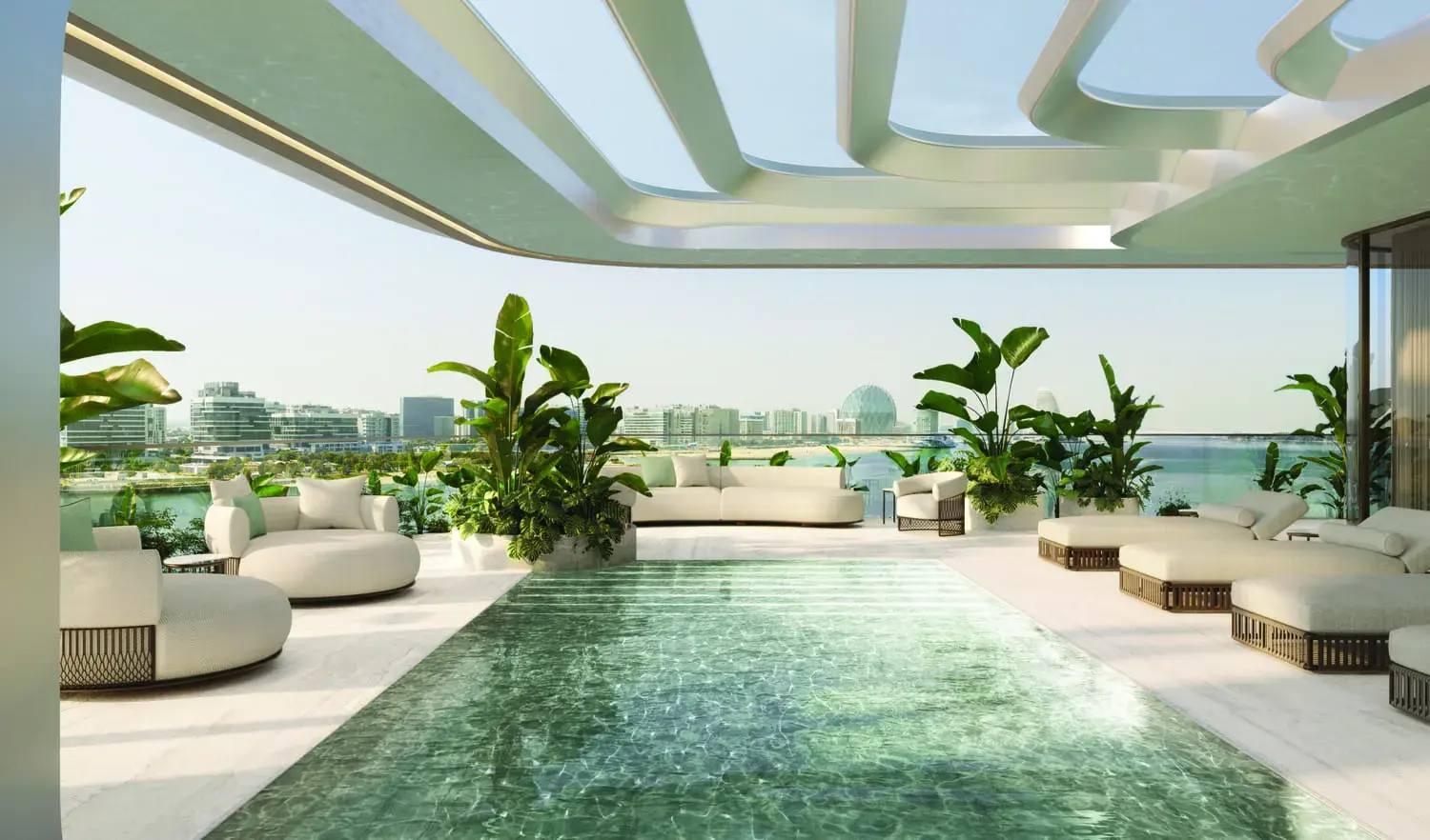 Infinity pool terrace at Stellar by Elie Saab surrounded by greenery and shaded waterfront seating