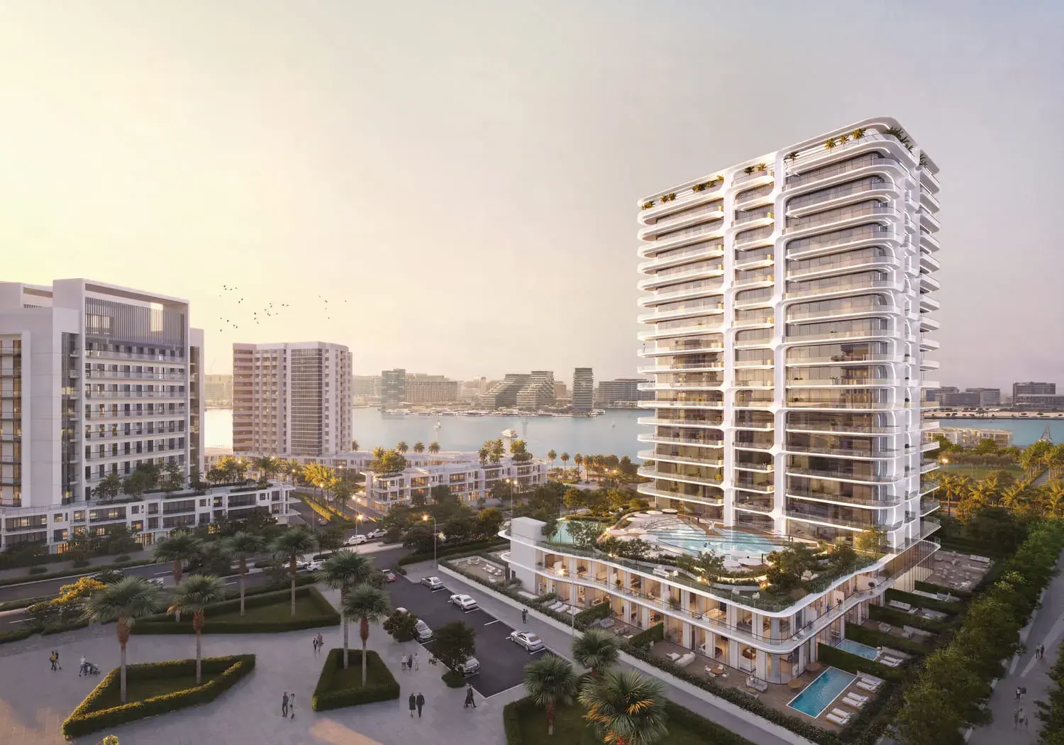 Stellar by Elie Saab tower rising above landscaped gardens and neighbouring residences on Yas Island