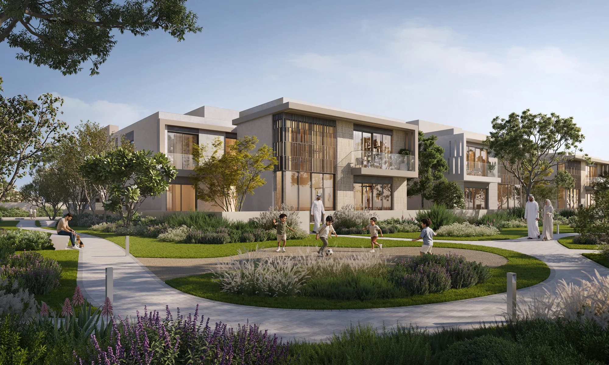 Landscaped lawn and play space among Talay villas at Marsa Al Saadiyat