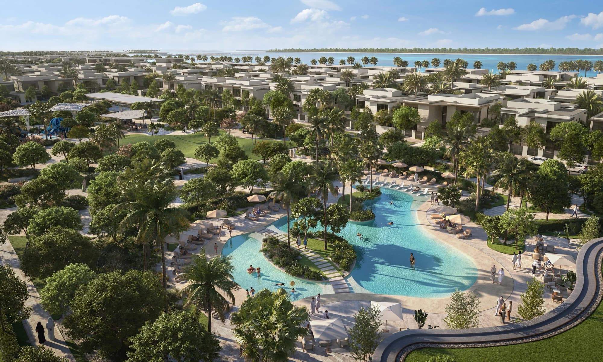 Aerial view of a community pool among Talay villas at Marsa Al Saadiyat