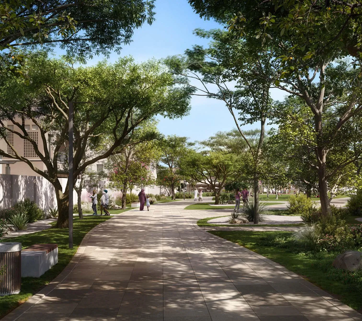 Wadeem Gardens landscaped pedestrian walkway with mature trees by Modon on Hudayriyat Island, Abu Dhabi