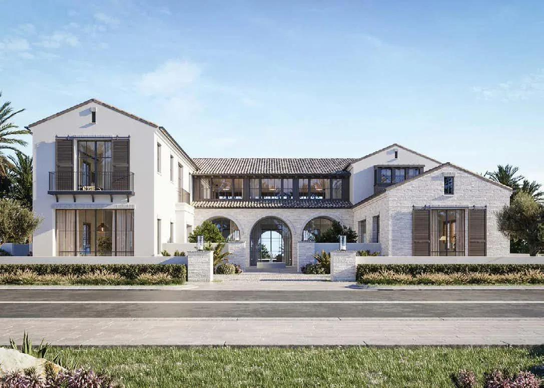 Wadeem Gardens villa street front with arched stone entrance by Modon on Hudayriyat Island, Abu Dhabi